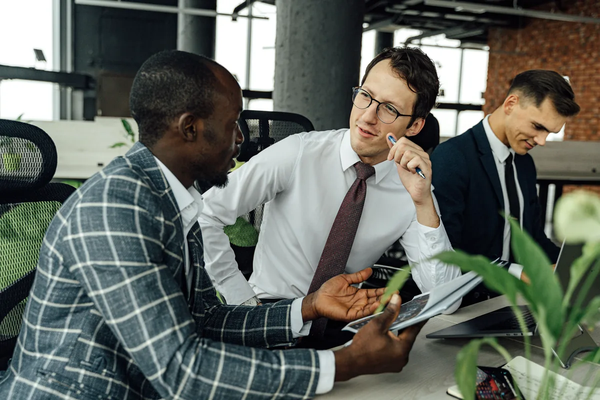 Two engineers working through training material
